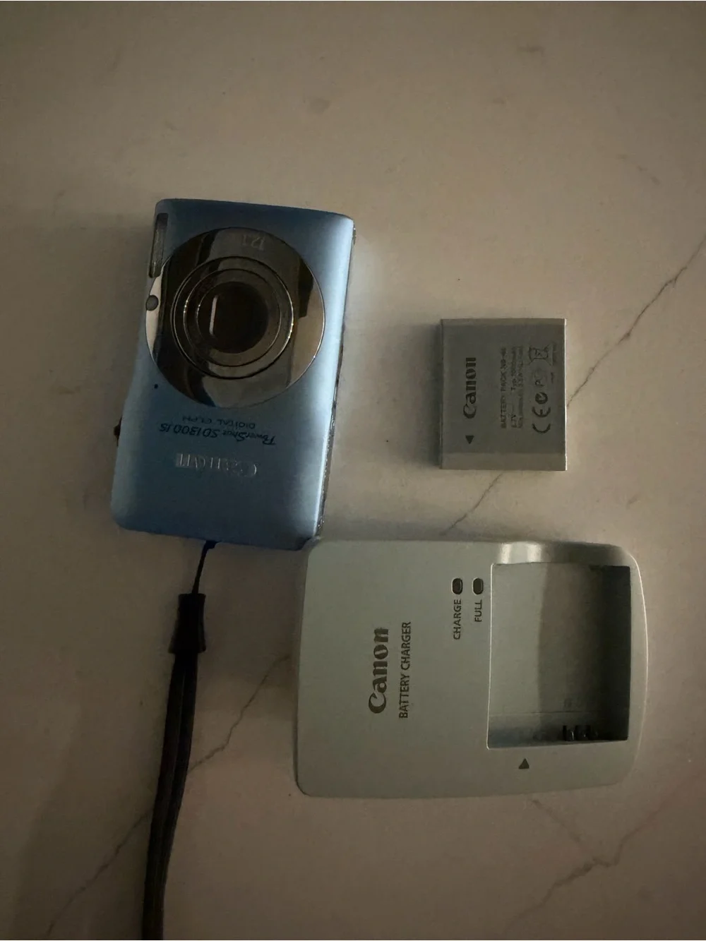 Canon Power Shot SD1300 IS digital camera features a 12.1-megapixel CCD sensor